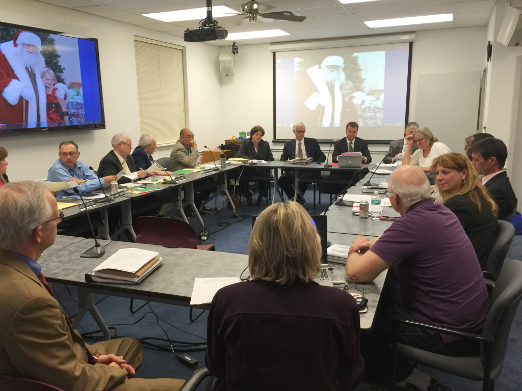 AT THE CONCLUSION of a closed session to discuss the Clark Construction plan for the George Mason High School site Monday, members of the F.C. City Council and School Board relaxed for a moment before concluding their discourse. (Photo: News-Press)